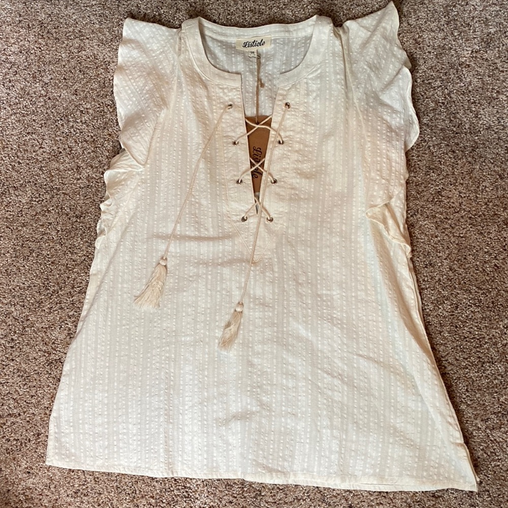 cream colored tanktop/shirt